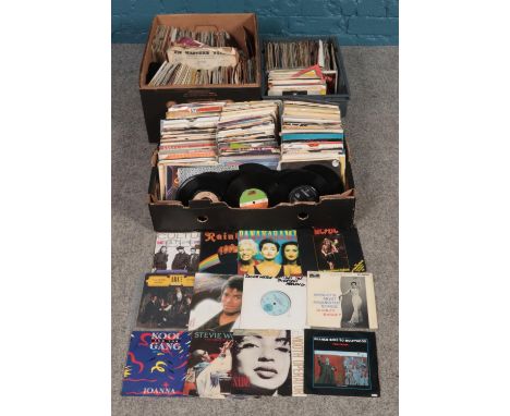 Three boxes of 45 RPM rock and pop records, including ABC, Stevie Wonder, Michael Jackson and Bananarama.  
