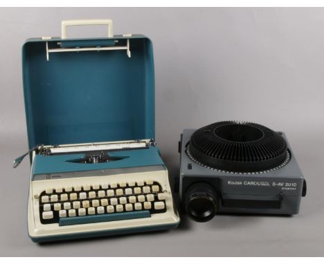 A Kodak Carousel S-AV 2010 Projector, together with a cased Imperial 220N typewriter.  