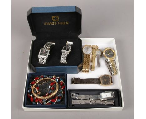 A tray of assorted watches and costume jewellery. To include a boxed ladies and gents Swiss Hills watch, Rotary, Citizen, Tim
