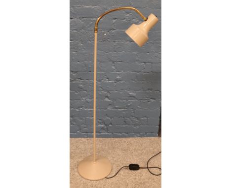 A metal adjustable reading lamp.  