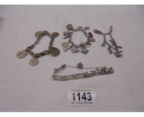 3 charm bracelets - 1 with coins, 1 with 925 St. Christopher and a gate bracelet with 925 silver heart padlock.