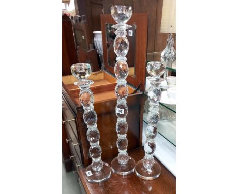 3 tall heavy glass candlesticks height 58.5cm to 78.5cm COLLECT ONLYBoth short candlesticks have small chips to base, can't s