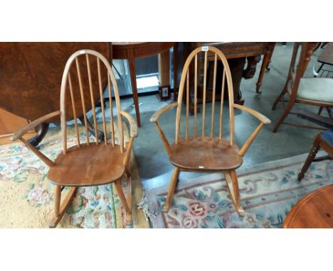 A pair of low Ercol rocking chairs