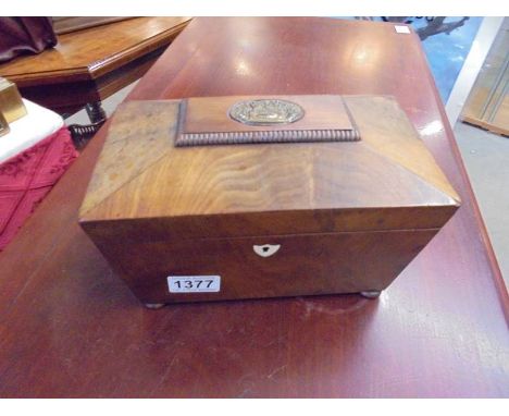 A Victorian mahogany tea caddy.