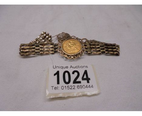 A 1906 half sovereign set in a 9ct gold gate bracelet with padlock, total weight 15.3 grams.