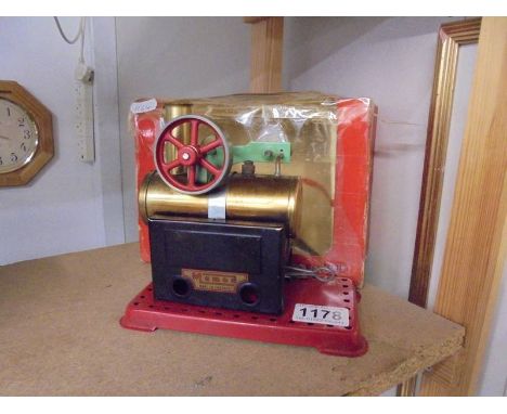 A boxed Mamod steam engine.
