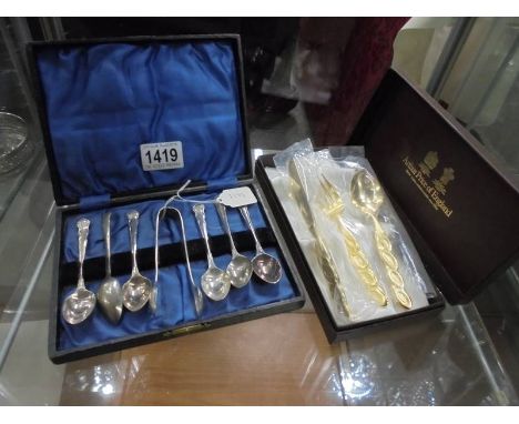 A cased set of EPNS teaspoons with sugar tongs and an Arthur Price knife, fork and spoon.