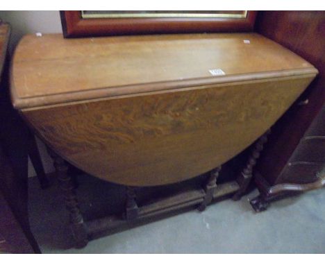 An oak barley twist gate leg table, COLLECT ONLY.