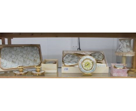 A superb quality vintage dressing table set decorated with birds and comprising tray, table lamp, candlestics, clock, powder 