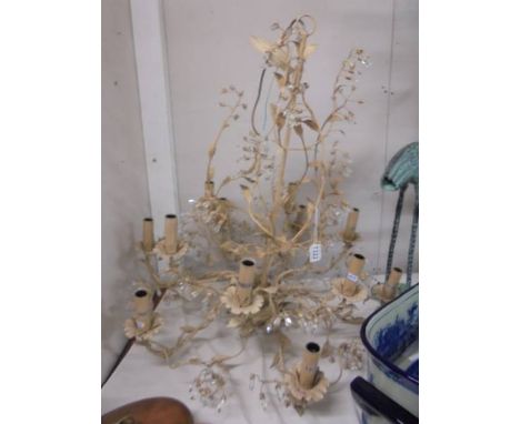 A twelve light metal chandelier, COLLECT ONLY.