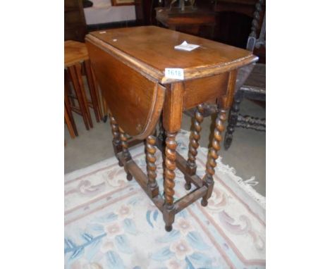 A small oak barley twist gate leg table. COLLECT ONLY.