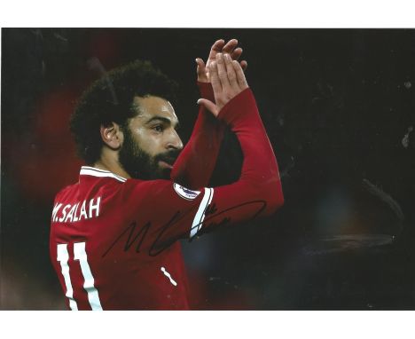 Football Mo Salah signed 12x8 colour photo pictured while playing for Liverpool. Good condition. All autographs come with a C