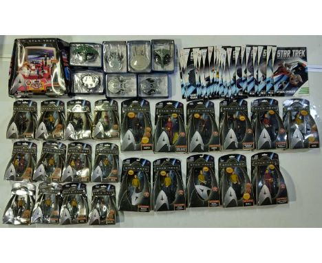 Approx 30 boxed Star Trek collectables mostly by 'Playmates'.