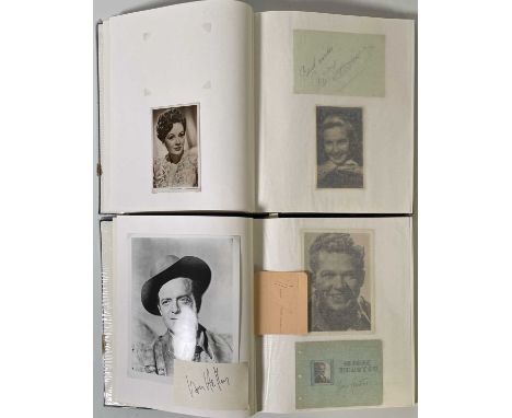 Two albums containing approx 160 signed items, chiefly autograph book pages, sometimes with accompanying vintage postcards. B