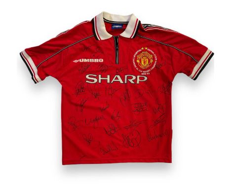 A Manchester United 1999 'Champions League Winners' home shirt (youth sized) signed by approx 28 to inc Alex Ferguson, Teddy 