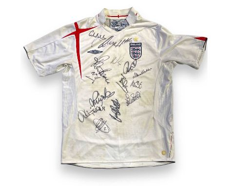 A c 2005-2007 England home shirt (L, with extensive staining) signed by 13 ex England players to inc Colin Bell, John Barnes,