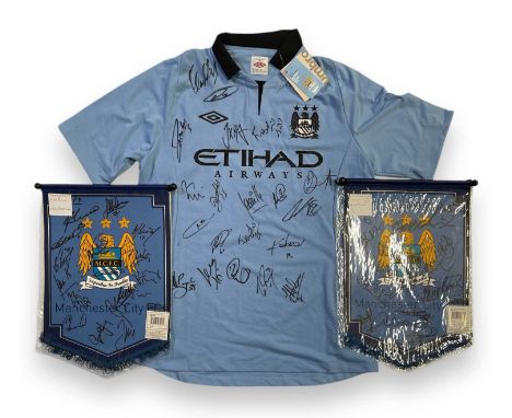 A c 2012/13 Manchester City football shirt (with tags, size 42, some staining) signed by 20 players to inc Joleon Lescott, Ca