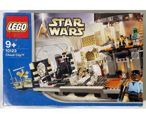 A boxed set of Lego 10123 'Cloud City' Star Wars. Inc instructions, contents not checked otherwise. Tape and wear to box.