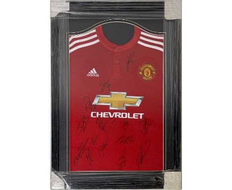 A mounted, framed and glazed display to include a c 2017 Manchester United home shirt signed by 14 players inc Ander Herrera,