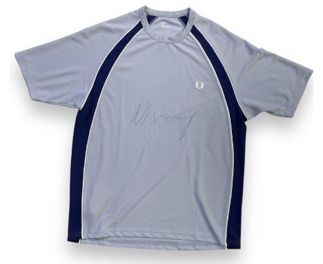 A Fred Perry tennis t-shirt (M) signed to front by Andy Murray.