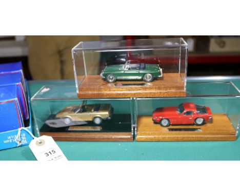 3 RAE Miniature Classics white-metal 1:43 scale Sports Cars. TVR 3000M. In red with black interior. Triumph TR6 soft-top. In 