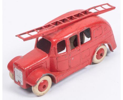 A Dinky Toys 25h Streamlined Fire Engine. An early (first) example without baseplate in red with smooth red wheels and origin