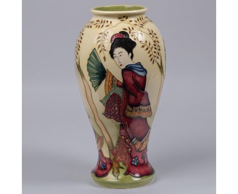 A Moorcroft pottery vase. With Japanese figures on a cream ground. Marks to base, HM, eye date cypher for 1994 and M.C.C. for