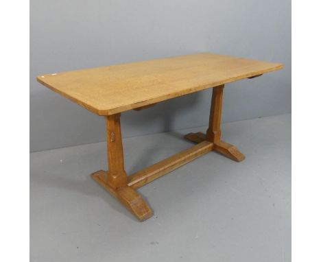 ROBERT MOUSEMAN THOMPSON - An oak refectory style dining table, with 3cm thick plank top, raised on octagonal end column supp