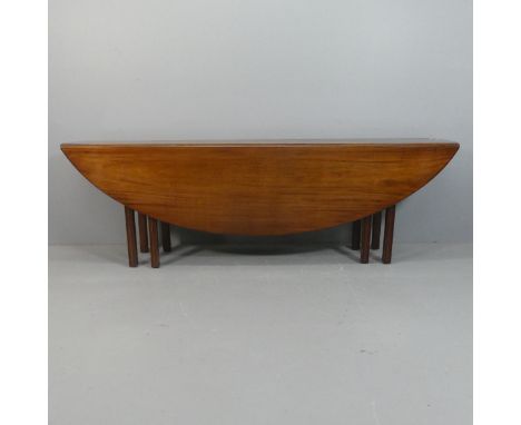 An antique mahogany Wake table raised on fluted legs. Length 244cm, height 77cm, width 38cm (extending to 145cm).Good conditi