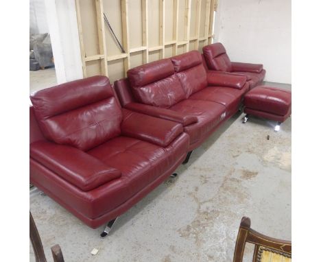 A Harveys Genoa - four piece read leather seat comprising three seater sofa, a pair of armchairs and a footstool. Sofa overal