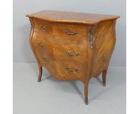 A French kingwood bombe commode chest of three drawers, with inlaid floral marquetry decoration and ormolu mounts. Width 90cm