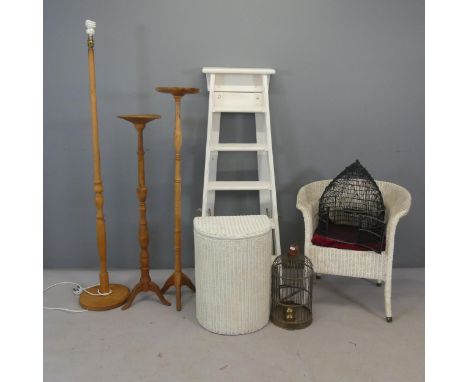 A Lloyd Loom bedroom chair and laundry basket, a painted pine step ladder, two torcheres, a standard lamp and two bird cages.