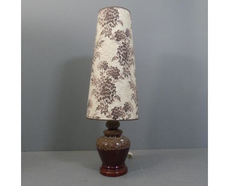 A West German style floor lamp. Height including shade 116cm.Slight dent to shade. Turns on when plugged in, but not PAT test