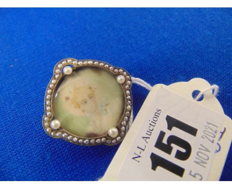 A Victorian Pearl set miniature portrait brooch