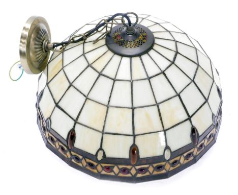 A Tiffany style opaque stained glass light fitting, decorated with red coloured cabochons. 