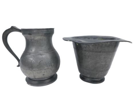 A 19thC pewter Welsh hat shaped commode, with moulded base, 21cm high (AF), and a large pewter flagon, 26cm high (AF). 