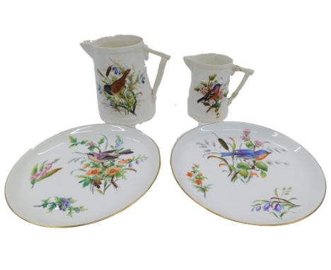 Four pieces of Royal Worcester, each painted with British garden birds, comprising a large jug, 16cm high, a smaller jug, 12c
