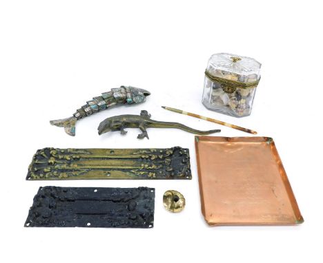 Miscellaneous items, to include two brass finger plates, an articulated mother of pearl fish, a metal lizard, glass tea caddy