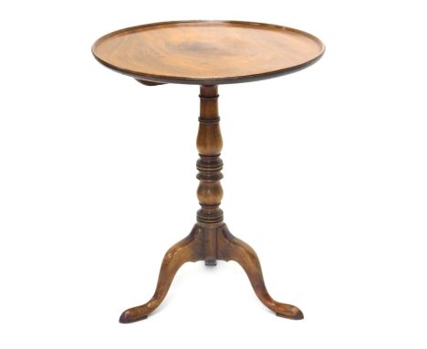 A 19thC mahogany tilt top occasional table, with a circular dish top and a turned column, on tripod base, 58cm wide. 