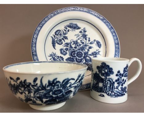 An 18th century Worcester blue and white porcelain bowlThree Flowers pattern; together with a similarly decorated side plate;