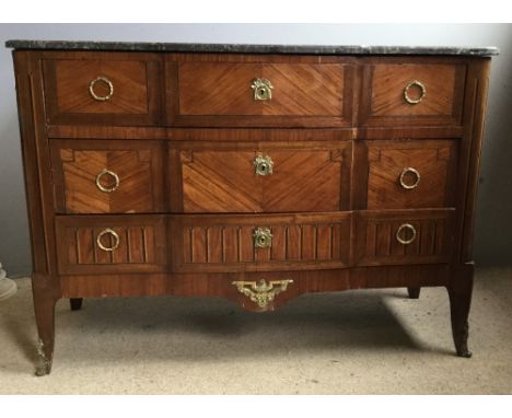 A 19th century Continental gilt metal mounted kingwood marble topped commode chestThe shaped black variegated marble top abov