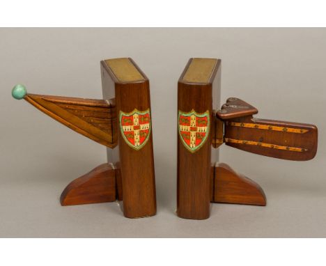 A pair of early 20th century Cambridge University mahogany rowing bookendsMounted with the prow and stern of a coxed rowing b