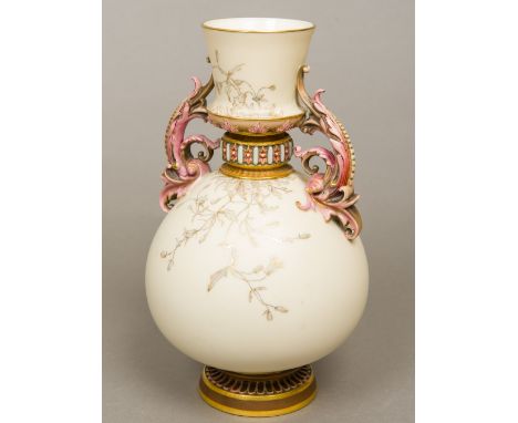 A 19th century Royal Worcester porcelain twin handled vaseTypically worked on an ivory ground, puce printed marks to base and