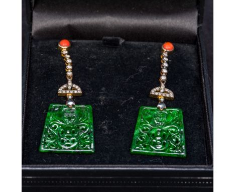 A pair of Art Deco style diamond, coral and jade ear pendantsEach set with a pierced mutton fat jade plaque carved with a bat