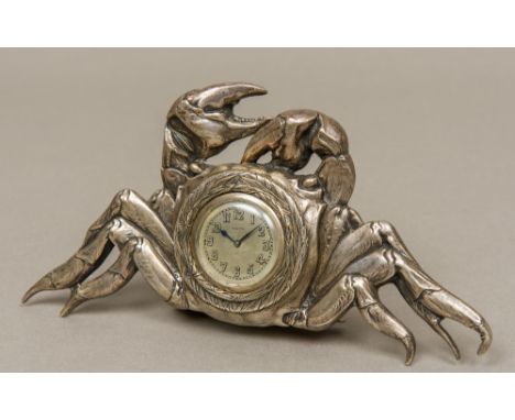 An 800 silver cased novelty desk clockFormed as a crab, the silvered Zenith dial with Arabic numerals, the back strut inscrib