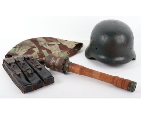 WW2 German M-40 Pattern Steel Helmet Shell, being a repainted ground dug relic example with remains of a decal to one side. T