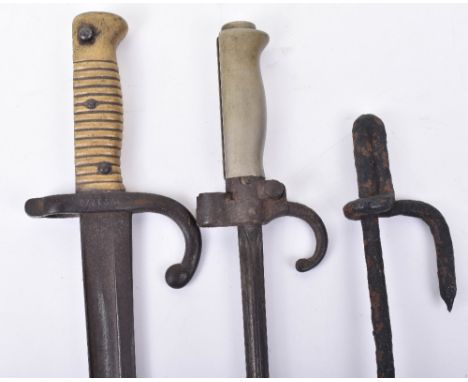 French Bayonets, consisting of brass hilted Chassepot bayonet without scabbard, Lebel rifle bayonet with downturned quillion 