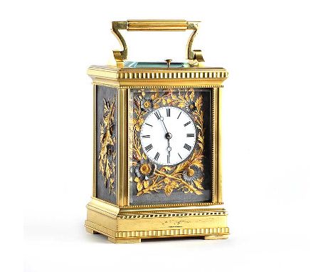 20TH CENTURY FRENCH BRASS CASED REPEATING CARRIAGE CLOCK WITH EMBOSSED BRASS SIDE PANELS AND A SWING HANDLE - - HEIGHT 6 INCH