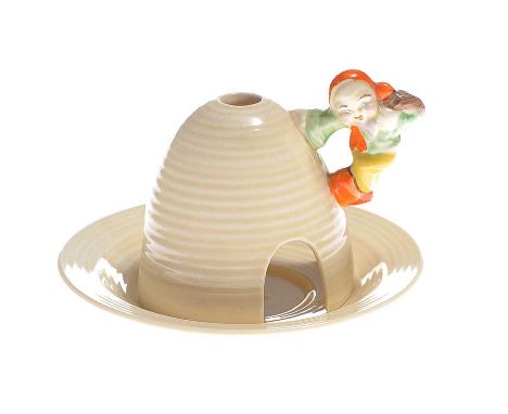 CLARICE CLIFF BEEHIVE SHAPE NIGHT LAMP WITH FIGURE ON HANDLE, WILKINSON & CO. ENGLAND - - LENGTH 4.5 INCHES X DIAMETER 5.5 IN
