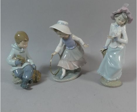 A Collection of Three Nao Ornaments, Children, Tallest 24cm 